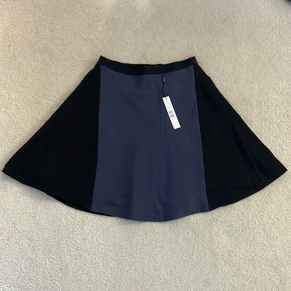 New with Tags Tahari shirt. Very cute. Size 4